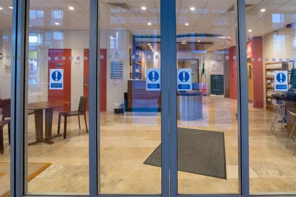 Porch sliding doors. This image shows the interior porch doors which lead into our reception area. These doors are automatic and slide apart from the centre to either side.